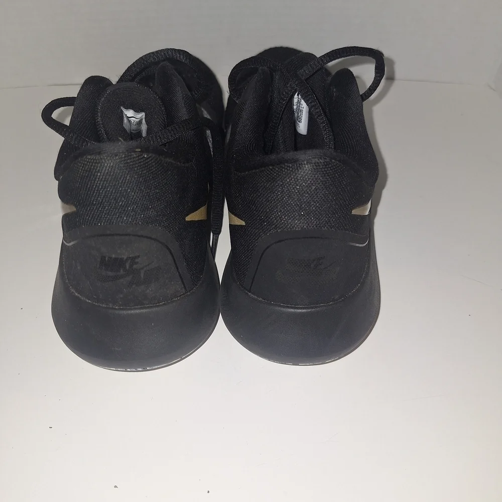 Nike Black and Gray Sneakers with Gold Swoosh
